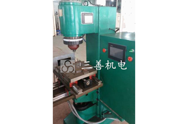 Riveting machine